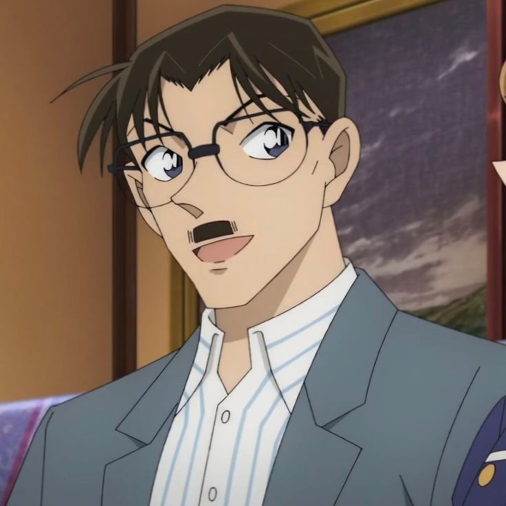 Yusaku Kudo - celebrated mystery novelist and Shinichi's father